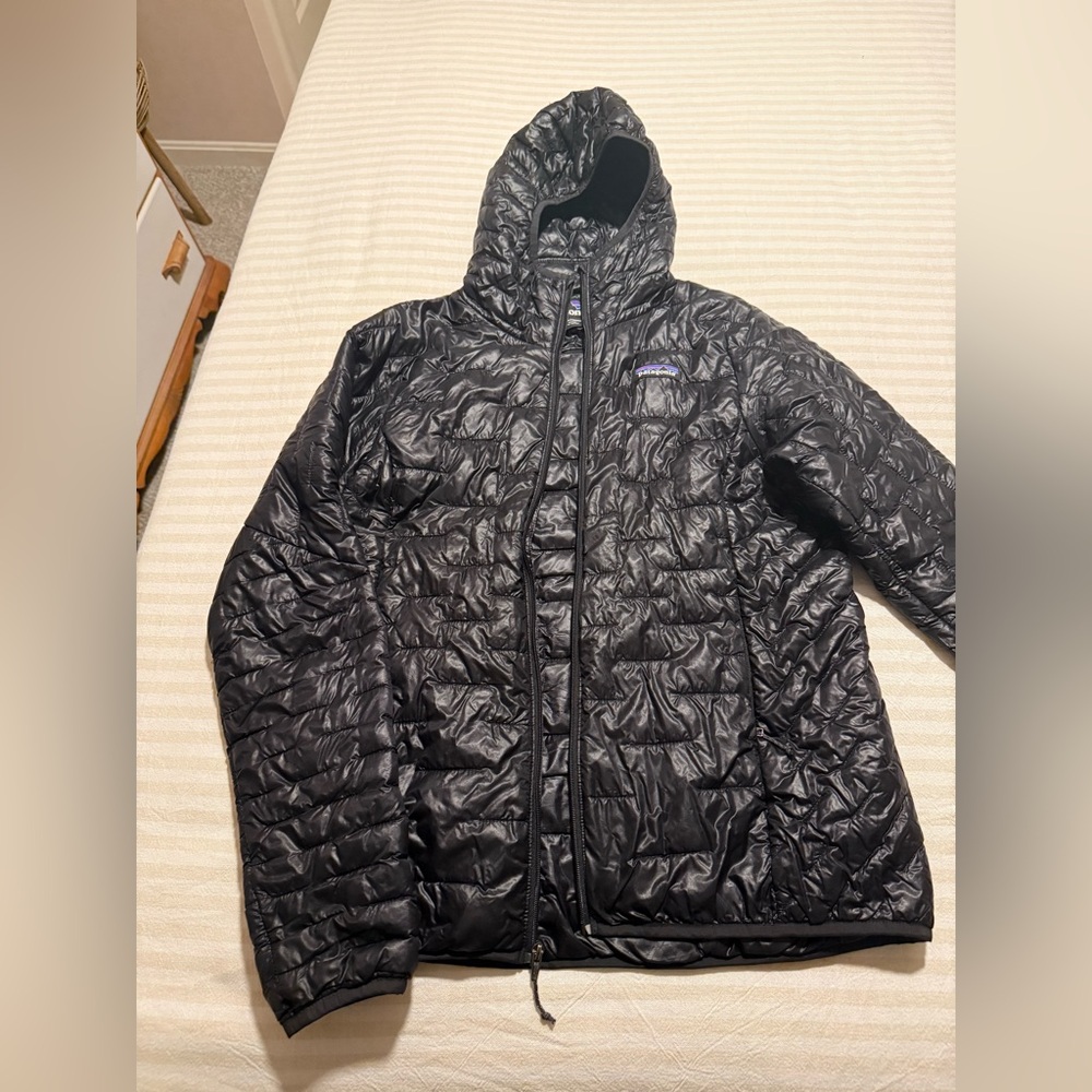 Black Patagonia Nano Puff Insulated coat with hood